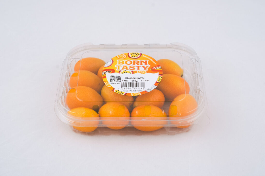 A punnet of bright orange Kumquats with Born Tasty packaging